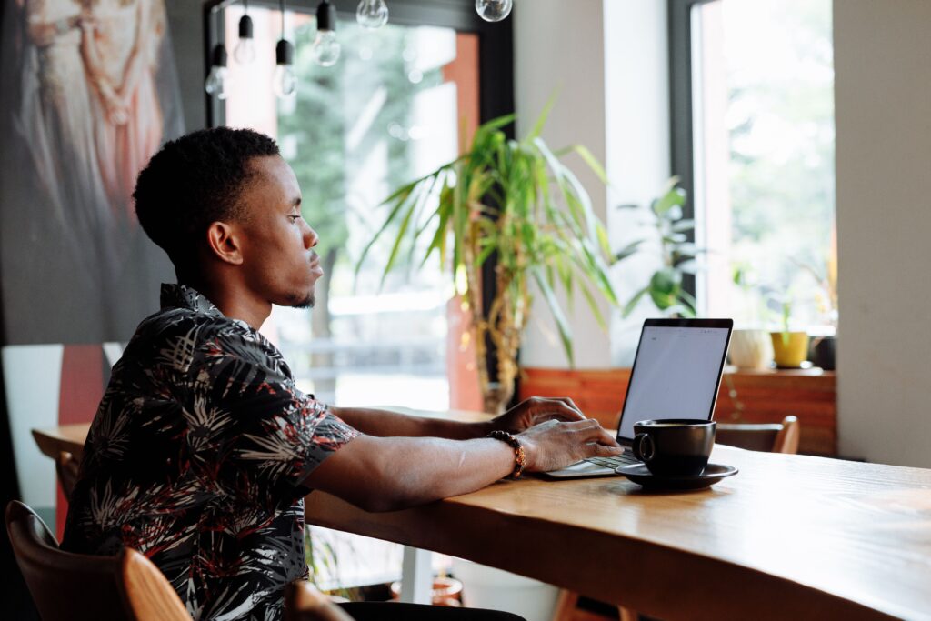 alt: recent graduate building a digital hustle in Kenya's stagnant job market