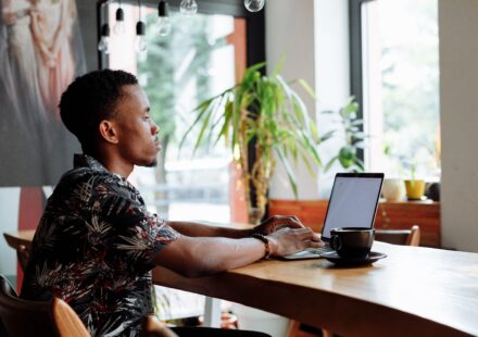alt: recent graduate building a digital hustle in Kenya's stagnant job market